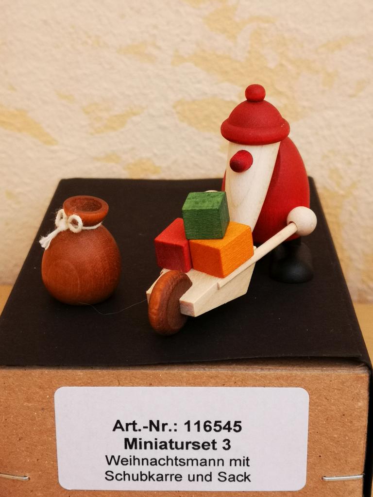 38 - Weihnachtsmann mit Schubkarre und Sack (Miniaturset 3)