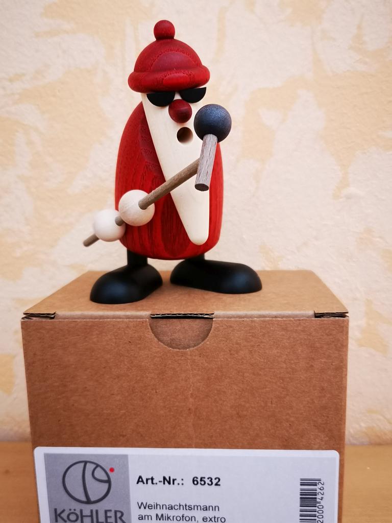 Weihnachtsmann mit Mikrofon extro